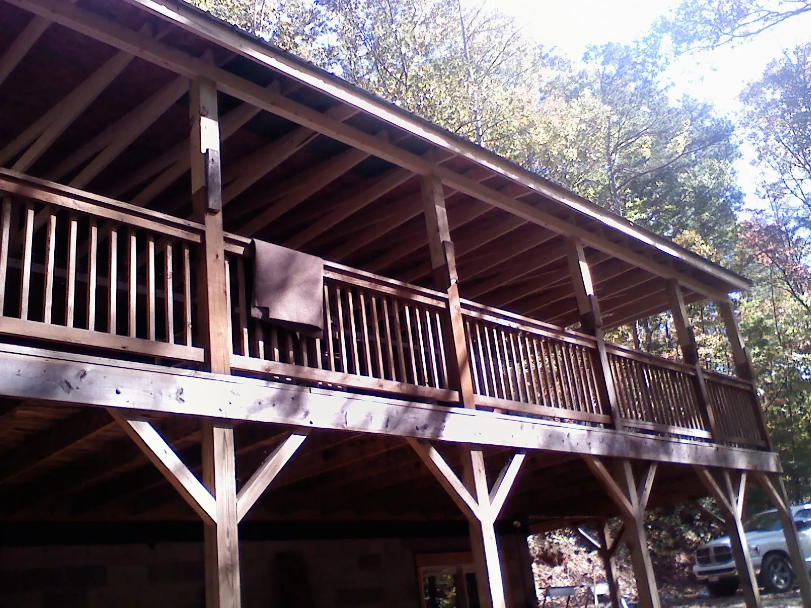 Timber framing under a new elevated porch and deck — Roof Leak Repair in New Rochelle by Roofing Brothers